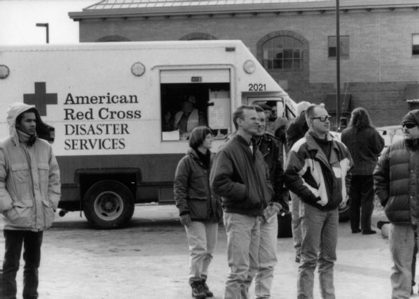 People watch the Washington Hotel fire